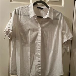 Like new! White short sleeve shirt. Only worn a few times.